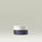 The image shows a small container labeled